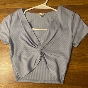 Blue front cross shirt.